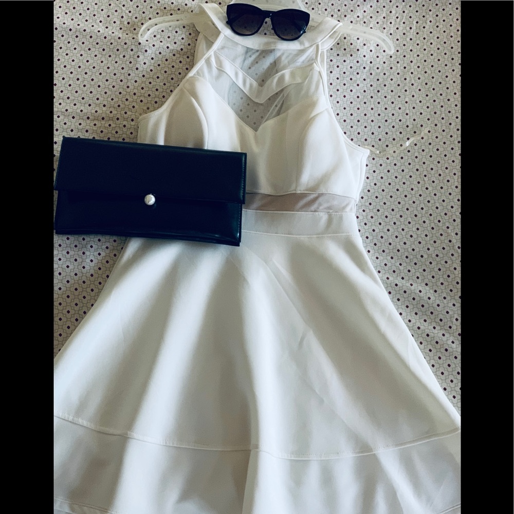 White, breast cupped, zip up, A Line Dress.